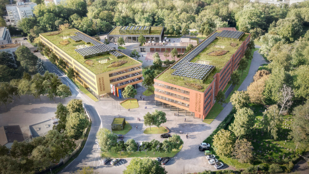 Visulisierung: Die Realschule und die Gesamtschule aus der Vogelperspektive umgeben von vielen Bäume, die Dächern sind begrünt und mit Photovoltaikmodulen bestückt.